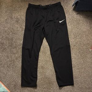 Nike Men's Black Dri-Fit Joggers with White Swoosh